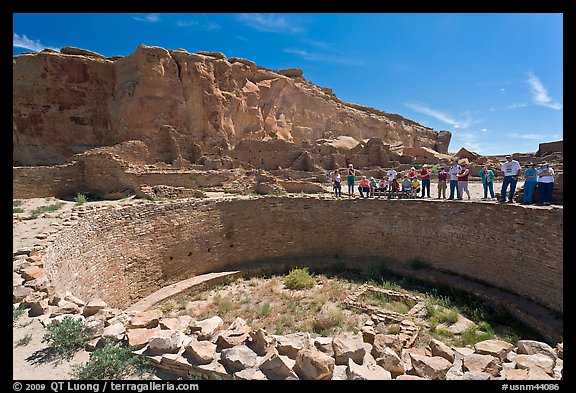 Tourists during a tour of Pueblo Bonito. Chaco Culture National Historic Park, New Mexico, USA (color)