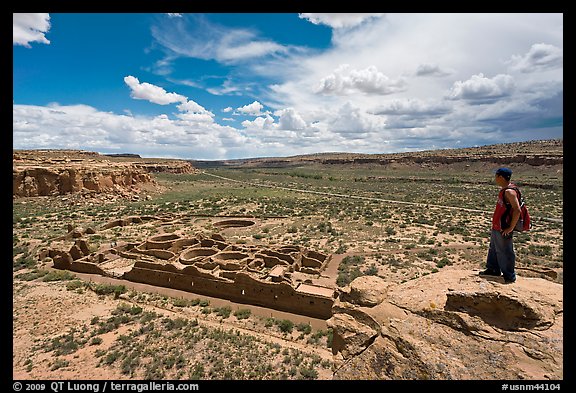 Man overlooking Chetro Ketl. Chaco Culture National Historic Park, New Mexico, USA (color)