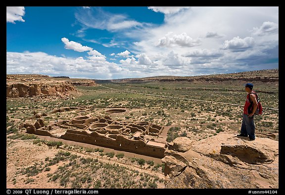 Man overlooking Chetro Ketl. Chaco Culture National Historic Park, New Mexico, USA