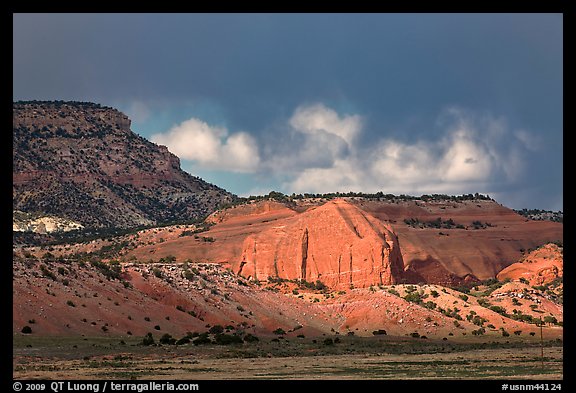 Red cliffs and dark sky. New Mexico, USA