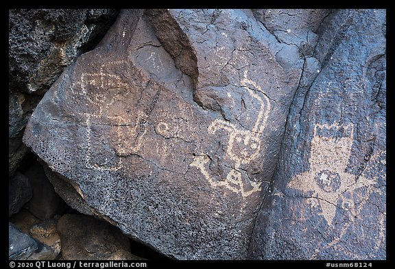 Petroglyphs including a star person, Petroglyph National Monument. New Mexico, USA (color)
