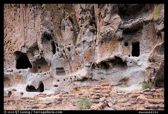 Walls built on Frijoles Canyon floor and dwellings in cavates. Bandelier National Monument, New Mexico, USA (color)