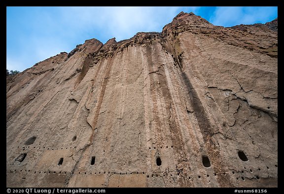 Cliff with bean holes and cavates. Bandelier National Monument, New Mexico, USA (color)