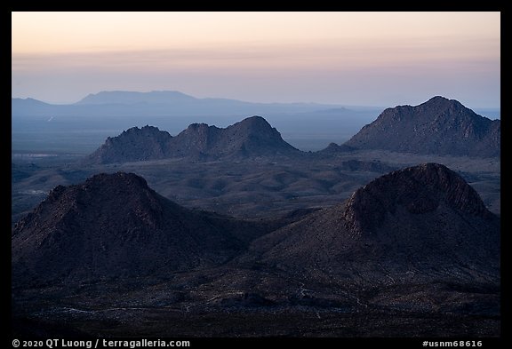 Cluster of Dona Ana mountains peaks at sunset. Organ Mountains Desert Peaks National Monument, New Mexico, USA (color)
