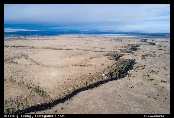 Aerial view of Pinabetal Mesa cut by Rio San Antonio. Rio Grande Del Norte National Monument, New Mexico, USA (color)