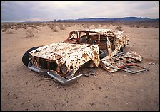 Car wreck used as a shooting target. USA ( color)