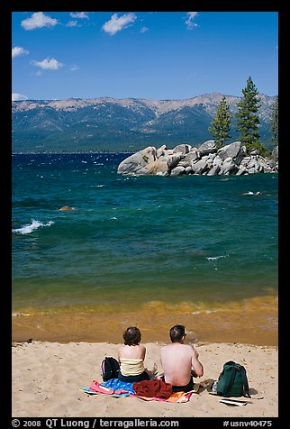 Couple on sandy beach, Lake Tahoe-Nevada State Park, Nevada. USA (color)