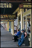 Arcade with suicide table sign. Virginia City, Nevada, USA (color)