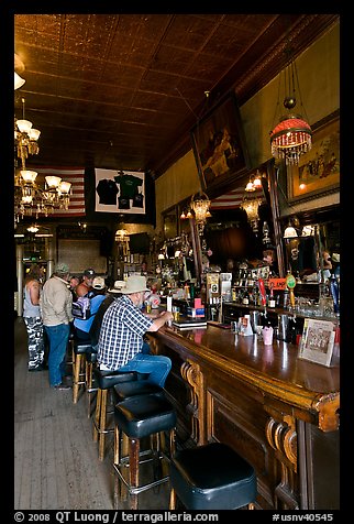 Men inside historic saloon. Virginia City, Nevada, USA (color)
