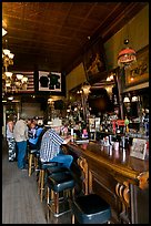 Men inside historic saloon. Virginia City, Nevada, USA