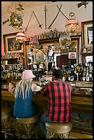 Man and woman sitting in saloon. Virginia City, Nevada, USA ( color)