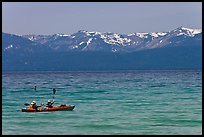 Kayak, turquoise waters and snowy mountains, East Shore, Lake Tahoe, Nevada. USA (color)