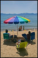 Beach unbrella and family, Sand Harbor, Lake Tahoe-Nevada State Park, Nevada. USA