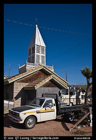 Truck and house with bell-tower, Beatty. Nevada, USA (color)