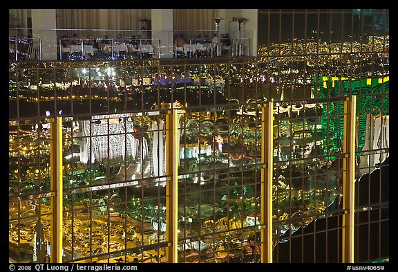 Restaurant and city reflections on glass windows, the Hotel at Mandalay Bay. Las Vegas, Nevada, USA (color)