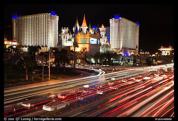 Traffic light trails and Excalibur casino at night. Las Vegas, Nevada, USA (color)