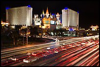 Traffic light trails and Excalibur casino at night. Las Vegas, Nevada, USA