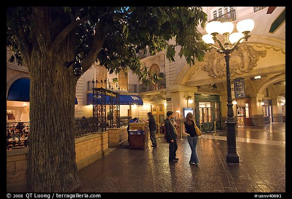 Picture/Photo: Man and woman standing on plaza inside Paris casino. Las  Vegas, Nevada, USA