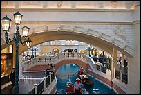 Gondolas passing below bridge, inside Venetian hotel. Las Vegas, Nevada, USA ( color)