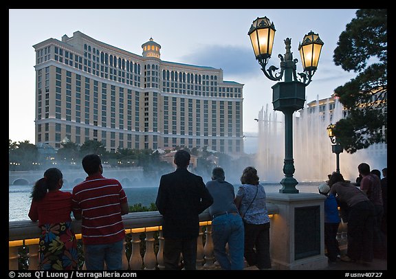 Watching the Fountains of Bellagio at dusk. Las Vegas, Nevada, USA (color)