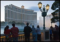 Watching the Fountains of Bellagio at dusk. Las Vegas, Nevada, USA (color)