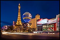 Las Vegas Boulevard and Eiffel Tower replica at dusk. Las Vegas, Nevada, USA ( color)