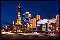 Las Vegas Boulevard and Eiffel Tower replica at dusk. Las Vegas, Nevada, USA