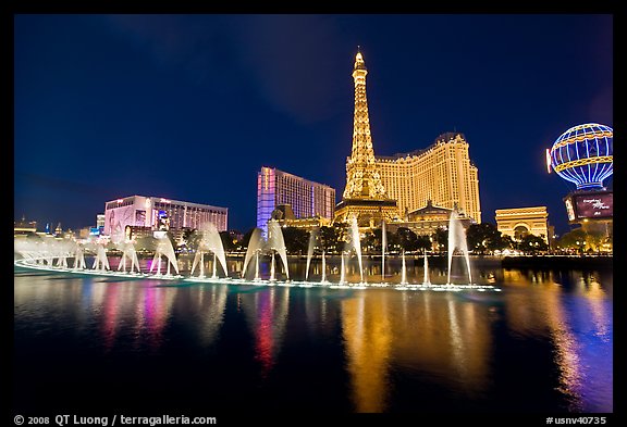 Paris casino and Bellagio fountains by night. Las Vegas, Nevada, USA