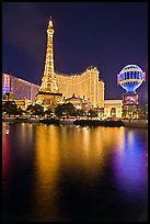 Paris Casino and Eiffel Tower reflected at night. Las Vegas, Nevada, USA (color)