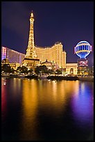 Paris Casino and Eiffel Tower reflected at night. Las Vegas, Nevada, USA (color)