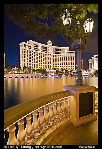 Lamp, reflection lake, and Bellagio hotel at night. Las Vegas, Nevada, USA (color)