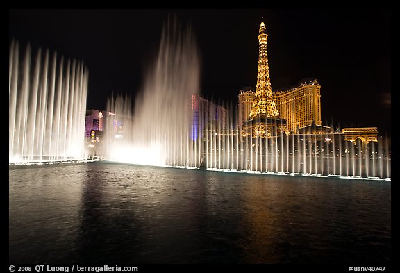 Bellagio fountains and Paris hotel by night. Las Vegas, Nevada, USA (color)