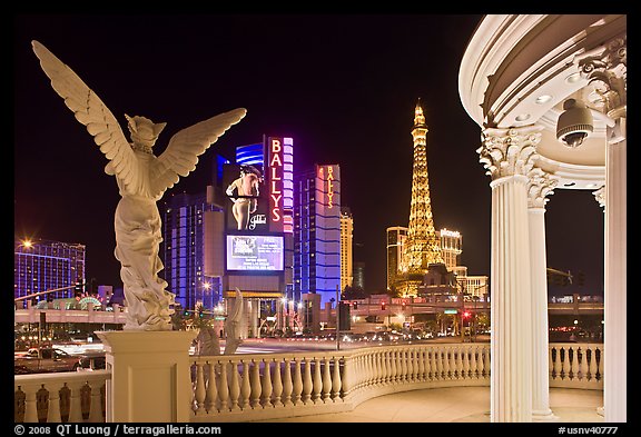 Gazebo and statue of Caesar Palace frames Ballys and Paris Hotel. Las Vegas, Nevada, USA