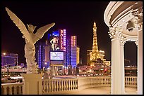 Gazebo and statue of Caesar Palace frames Ballys and Paris Hotel. Las Vegas, Nevada, USA