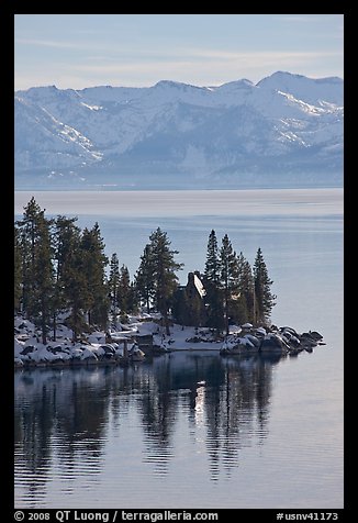 Cabin on lakeshore and snowy mountains, Lake Tahoe, Nevada. USA (color)