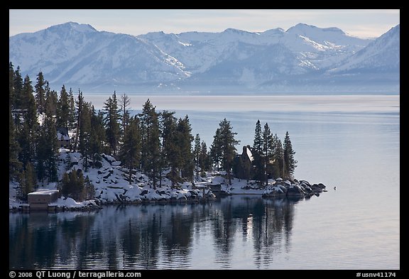 Lakeshore with houses and snow-covered mountains, Lake Tahoe, Nevada. USA (color)