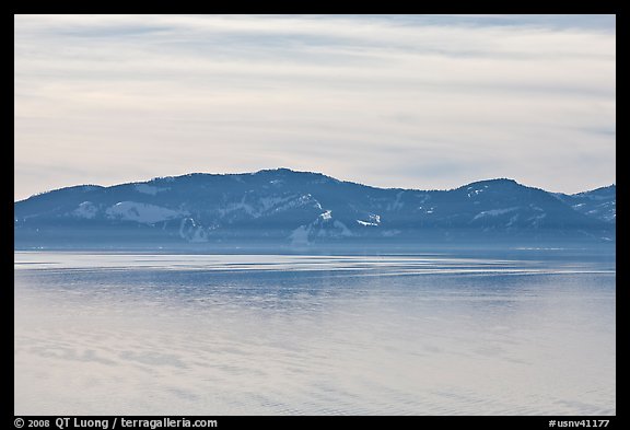 Distant mountains on lake rim in winter, Lake Tahoe, Nevada. USA