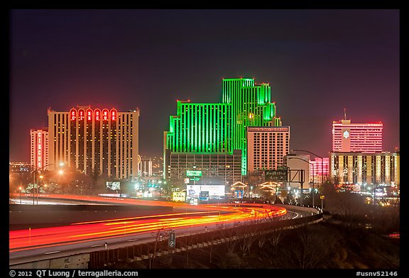 Illuminated casinos and freeway at night. Reno, Nevada, USA
