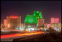 Illuminated casinos and freeway at night. Reno, Nevada, USA (color)