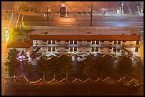 Motel from above on rainy night. Reno, Nevada, USA (color)