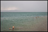 Families bathing in lake. Pyramid Lake, Nevada, USA ( color)