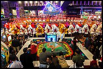View from above of people playing carnival fishing game. Reno, Nevada, USA (color)
