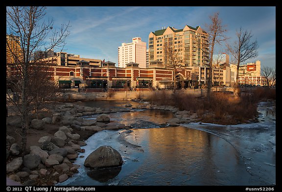 Riverwalk district buildings reflected in ice. Reno, Nevada, USA (color)