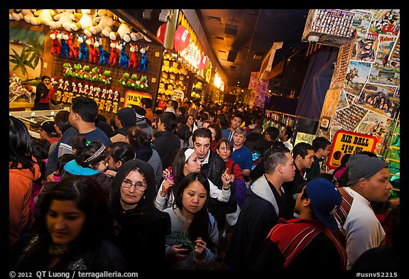 Densely packed crowds in circus arcade. Reno, Nevada, USA