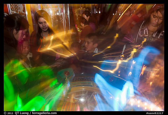 Fast moving lights and arcade game players. Reno, Nevada, USA