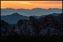 Whitney Pocket rocks and mountain ranges at sunset. Gold Butte National Monument, Nevada, USA ( color)