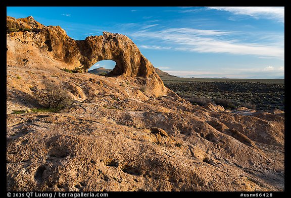 Slab and natural arch, early morning. Basin And Range National Monument, Nevada, USA (color)