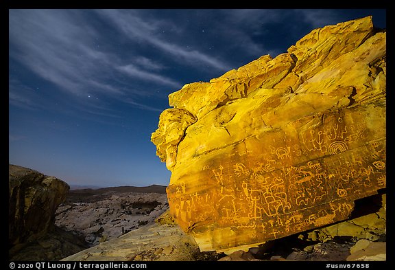 Rock with petroglyphs at night with clouds. Gold Butte National Monument, Nevada, USA (color)