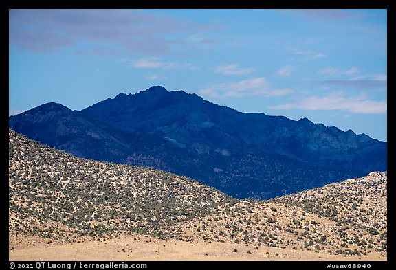 Sunlit foothills and mountain in shadow from Garden Valley. Basin And Range National Monument, Nevada, USA (color)