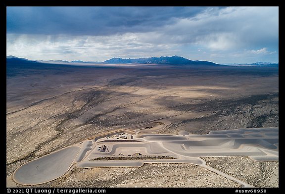 Aerial view of part of Michael Heizer's City with sun. Basin And Range National Monument, Nevada, USA